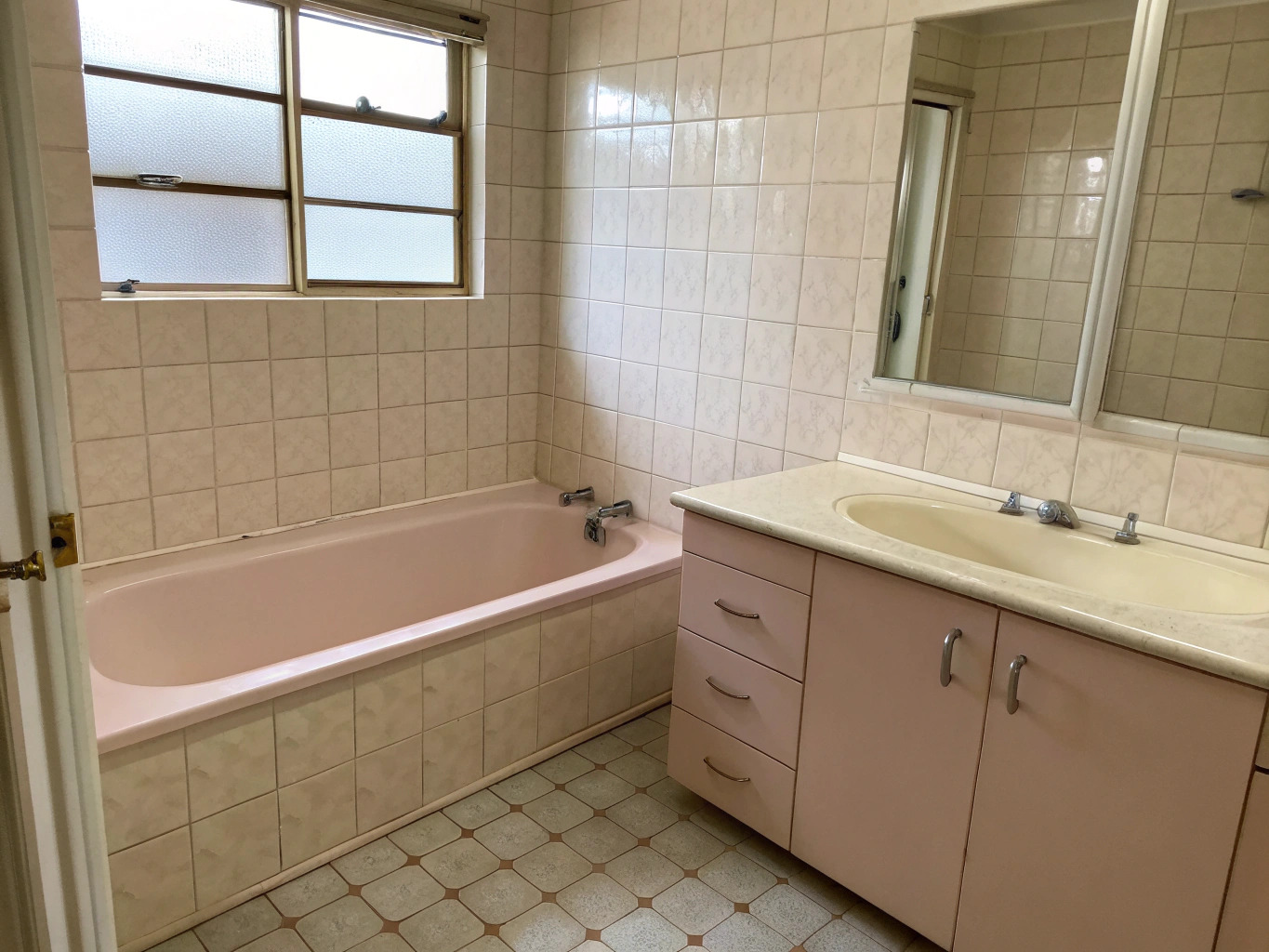 Dated bathroom before renovation